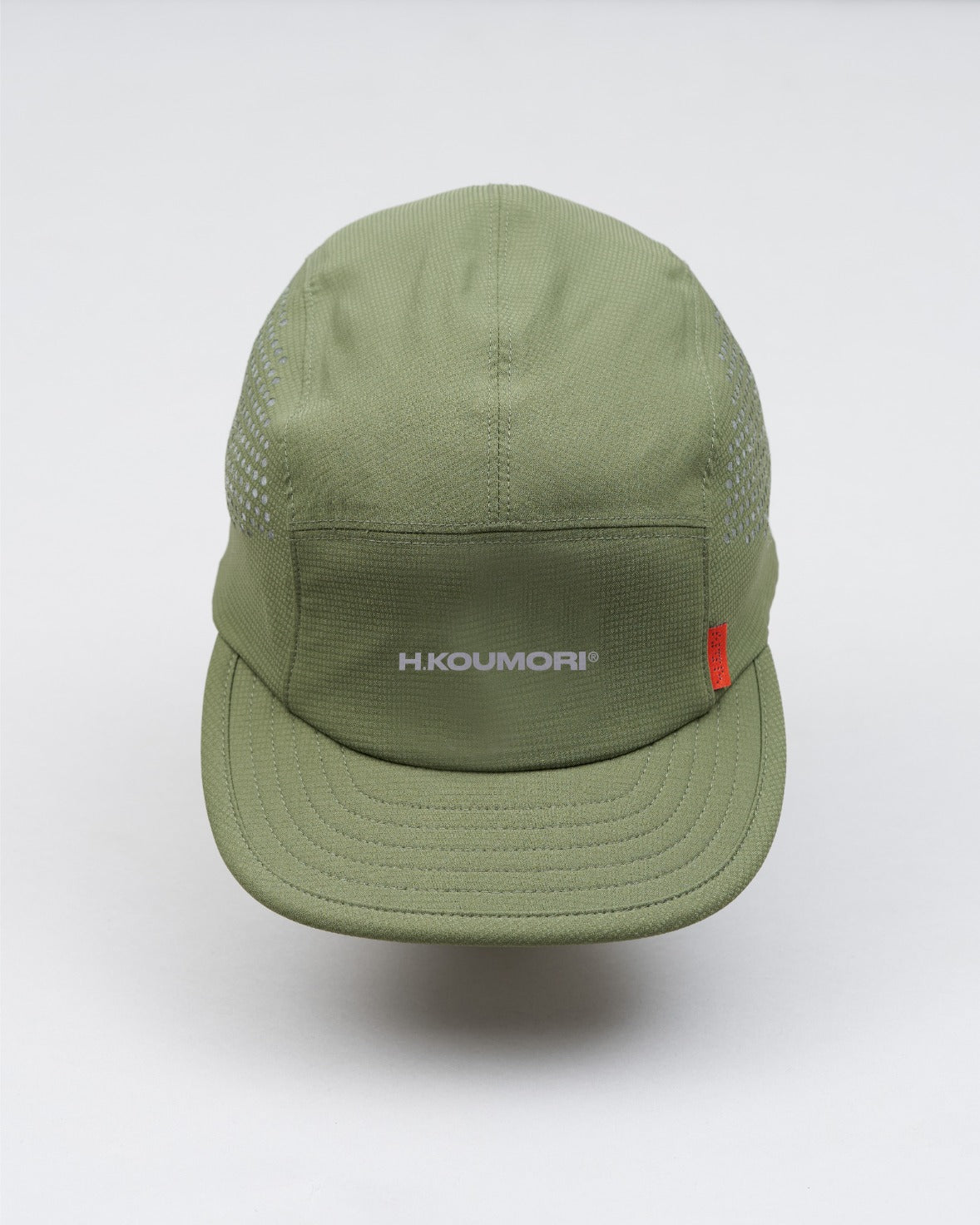 Gorra Koumori cortada con láser verde bosque